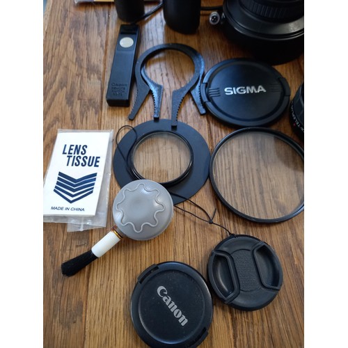 539 - Olympus om10 camera plus bag , coloured filters and 4 different lenses see photos