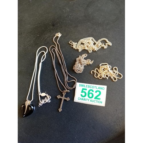 562 - 2x 925 silver pendants with chains, 3x scrap silver chains 29.5g total approx.