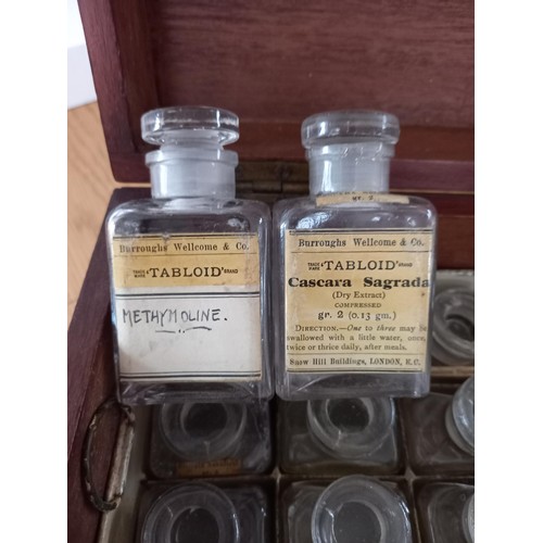 34 - Vintage Burroughs Wellcome & Co London medicine cabinet with bottles