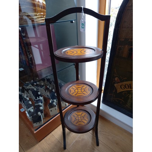 63 - Unusual painted three tier folding cake stand