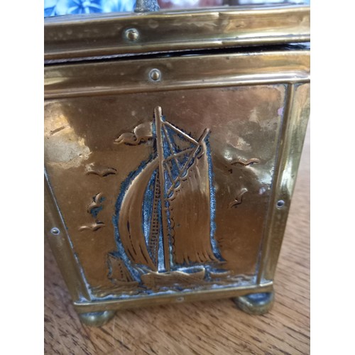 79 - Unusual brass tea caddy