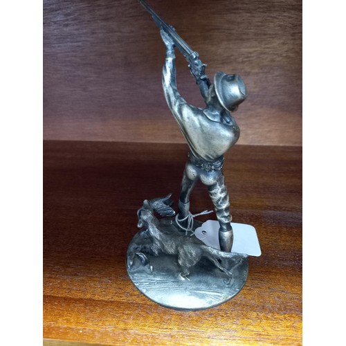 109 - white metal hunting figurine with dog