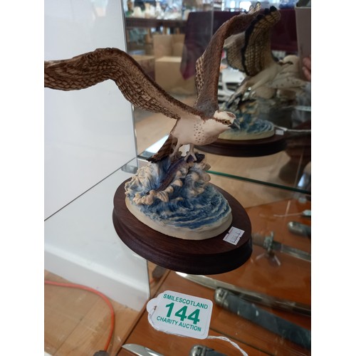 144 - Border Fine Arts Osprey catching fish, 1983, signed Ayres.P.T.