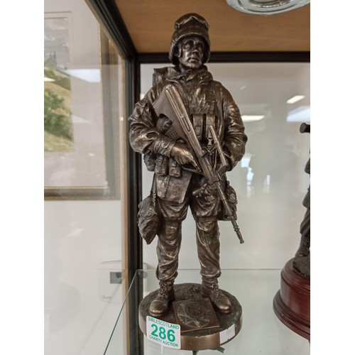 286 - Bronze figure of Irish Soldier with FF Crest 30cm H approx.