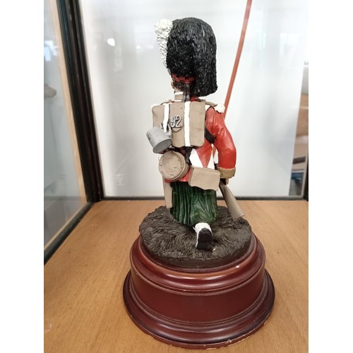 291 - Kneeling kilted soldier hand-painted Ballantynes of Walkerburn 24cm H approx.