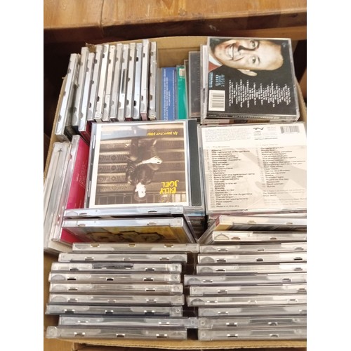 355 - 6 Boxes of CD's from a storage locker