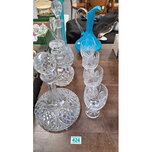 424 - Selection of glassware to include decanters vase etc.