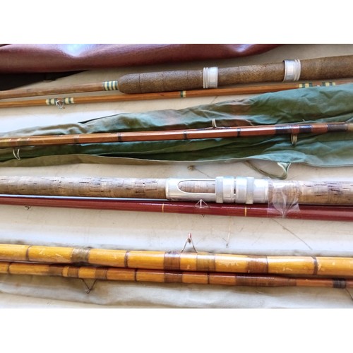 173 - Selection of vintage fishing rods and gaff