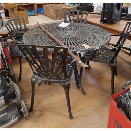 219 - Round metal garden table and 4 chairs