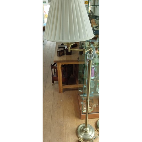 53 - A Pair of Swivel Standard Lamps