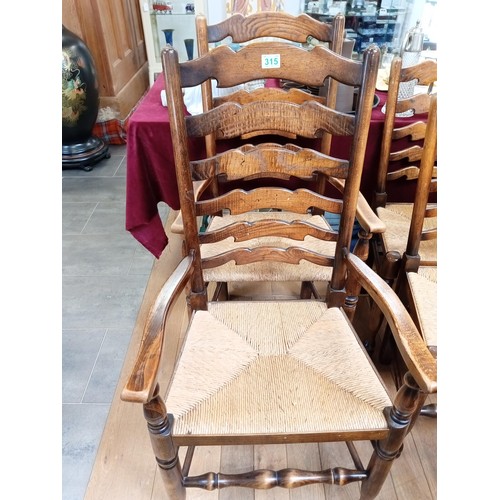 315 - two carvers and four ladderback ratten chairs