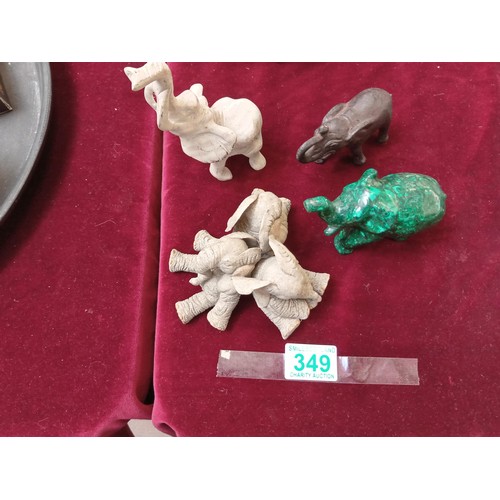 349 - four elephant figurines