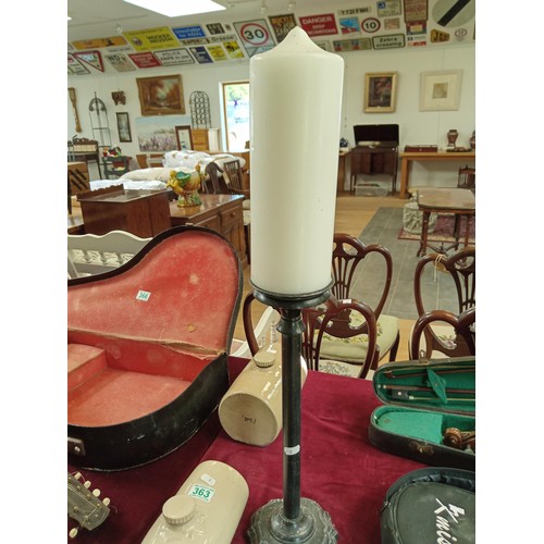 363 - candle stand, candle and two stone water bottles