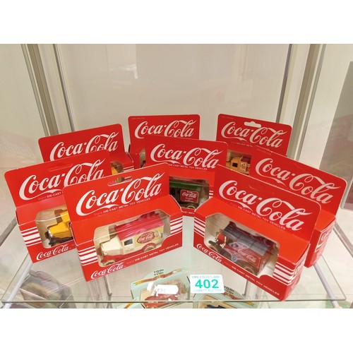 402 - 8 x Coca Cola Diecast Model Vehicles