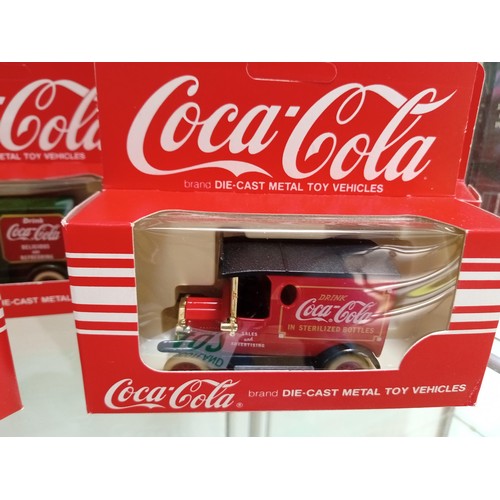 402 - 8 x Coca Cola Diecast Model Vehicles