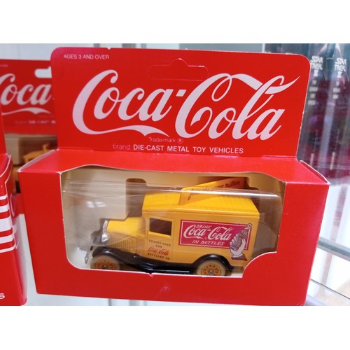 402 - 8 x Coca Cola Diecast Model Vehicles