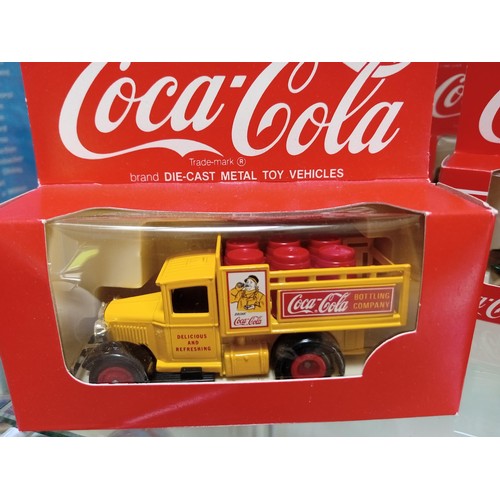 402 - 8 x Coca Cola Diecast Model Vehicles