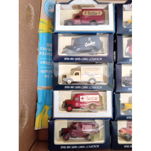 316 - 2 boxes of model trucks and vans