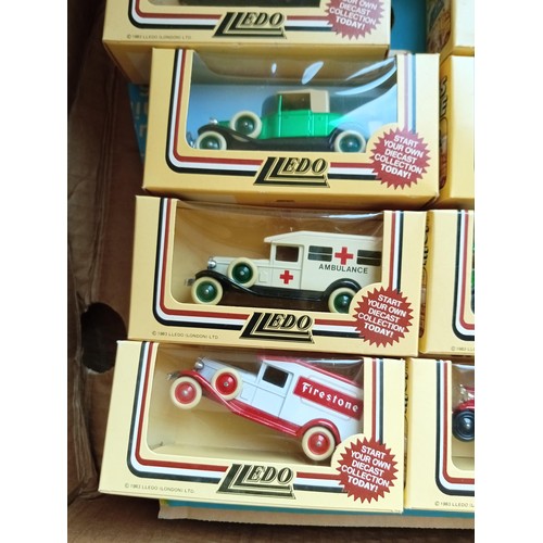 319 - 2 Boxes lledo model vans etc