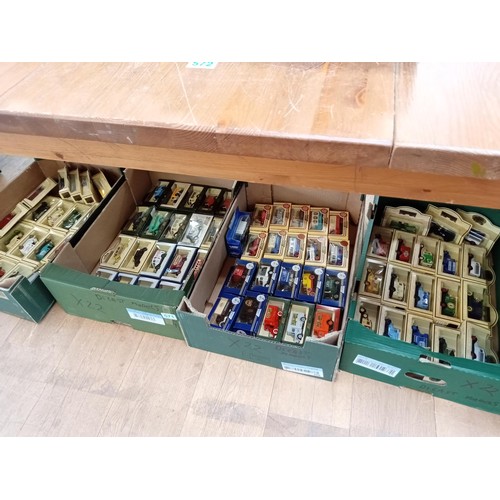 571 - 4 boxes of Days gone by and Lledo Model vehicles