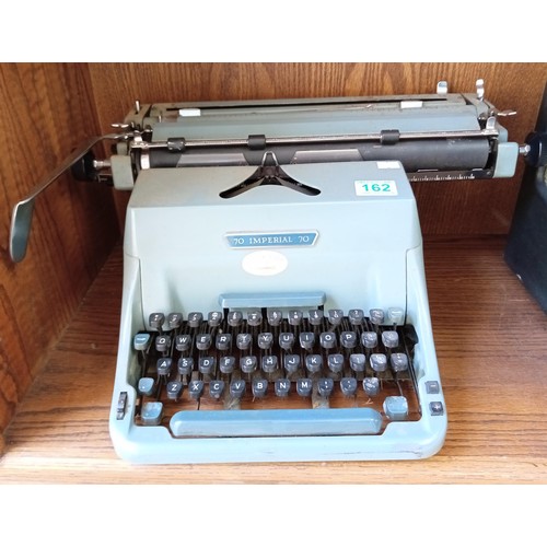 162 - Vintage material typewriter and Pye radio