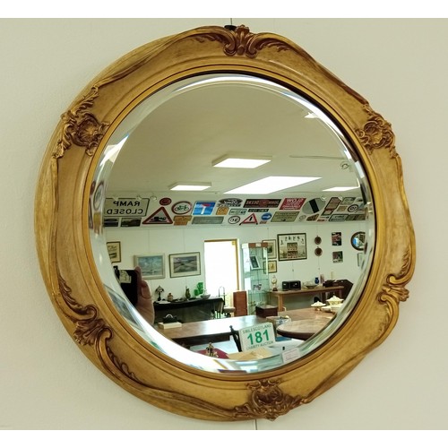 181 - Ornate round bevelled mirror