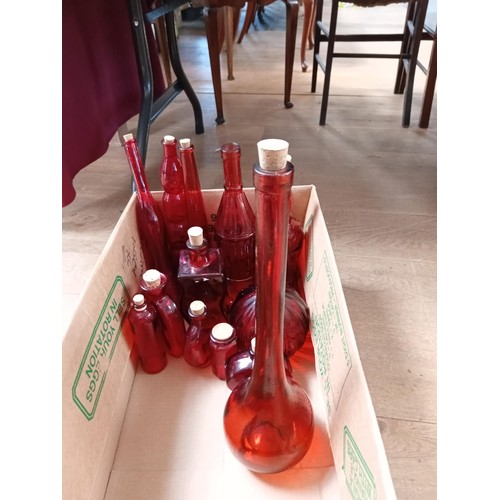 337 - Box lot of red glass bottles