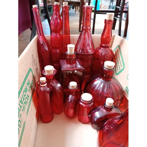 337 - Box lot of red glass bottles