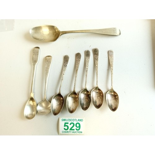 529 - A collection of 7 x silver hallmarked spoons and one other which has hallmarks (large spoon)