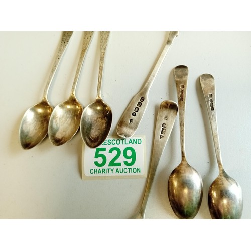 529 - A collection of 7 x silver hallmarked spoons and one other which has hallmarks (large spoon)