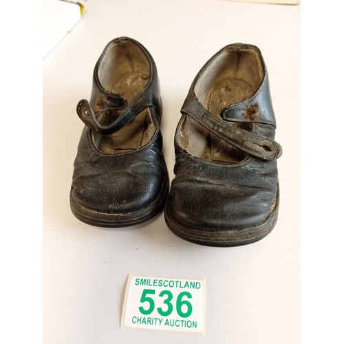 536 - A pair of vintage childs shoes