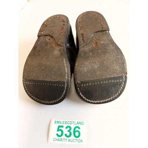 536 - A pair of vintage childs shoes