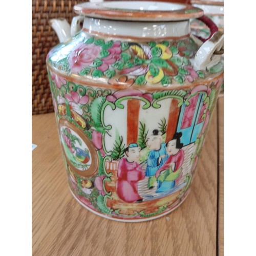 33 - oriental teapot in basket with cup and one other