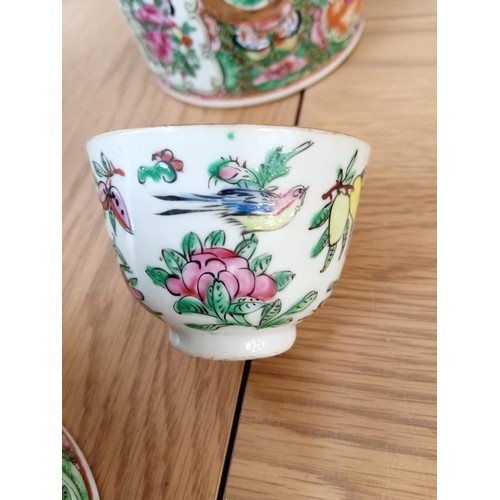 33 - oriental teapot in basket with cup and one other