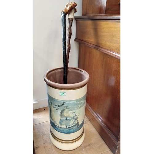 63 - ceramic walking stick stand with 2 sticks