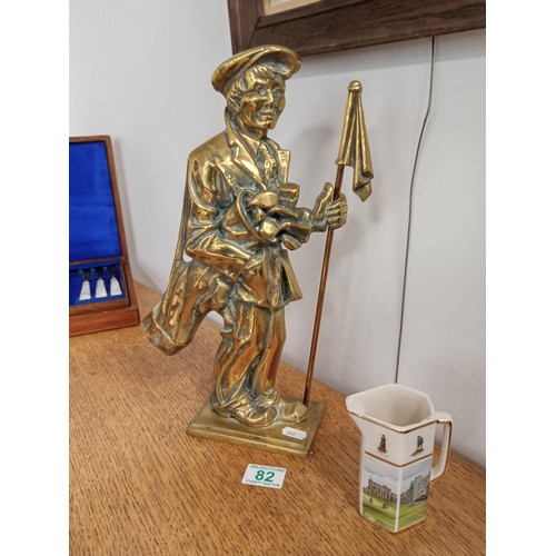 82 - brass Golfer and a whisky water jug