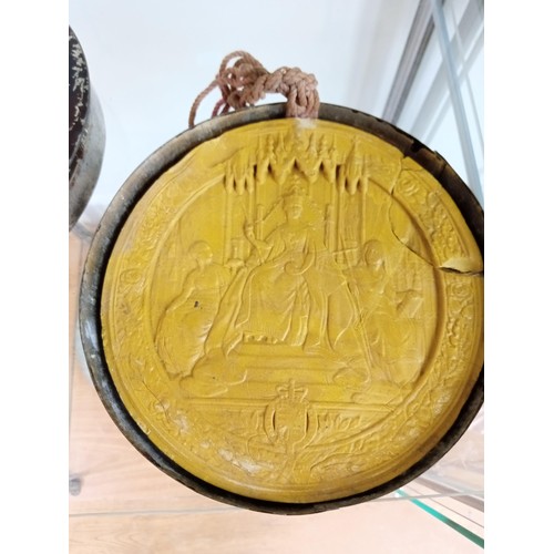 158 - historic seal in a tin