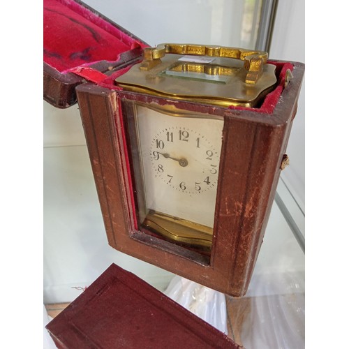 162 - Carriage clock in travelling case vintage plus one other