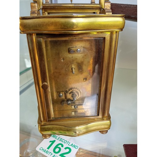 162 - Carriage clock in travelling case vintage plus one other