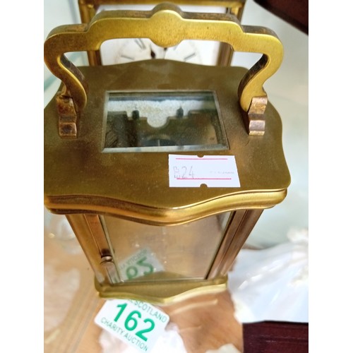 162 - Carriage clock in travelling case vintage plus one other