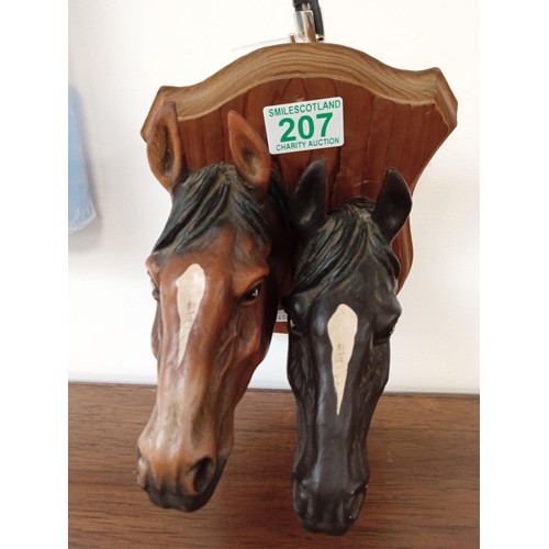 207 - double horse headed plaque