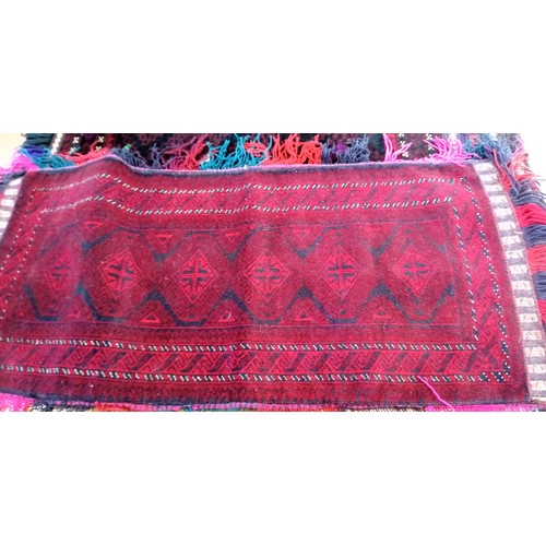 288 - A duo of ethnic carpet bags 116x52 and 114 x 77 cm approx