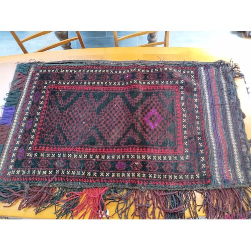 288 - A duo of ethnic carpet bags 116x52 and 114 x 77 cm approx