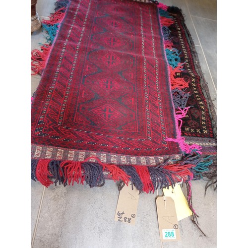 288 - A duo of ethnic carpet bags 116x52 and 114 x 77 cm approx