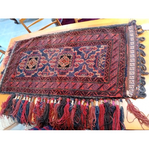 291 - a duo of ethnic carpet bags 109x61 and 120 x 77 cm approx