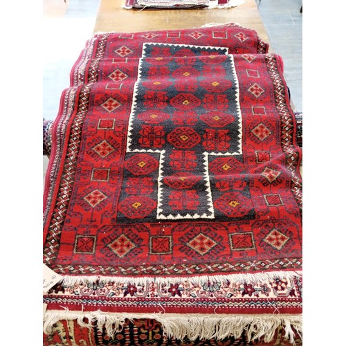 304 - Duo of ethnic woollen rugs 179x72 and 155 x 99 cm approx