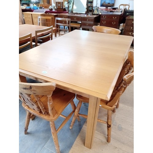 386 - Extending dining table with 4 pine dining chairs