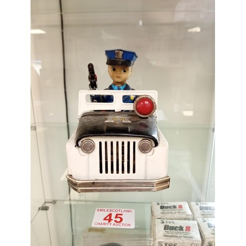 45 - Made in Japan tin plate police car