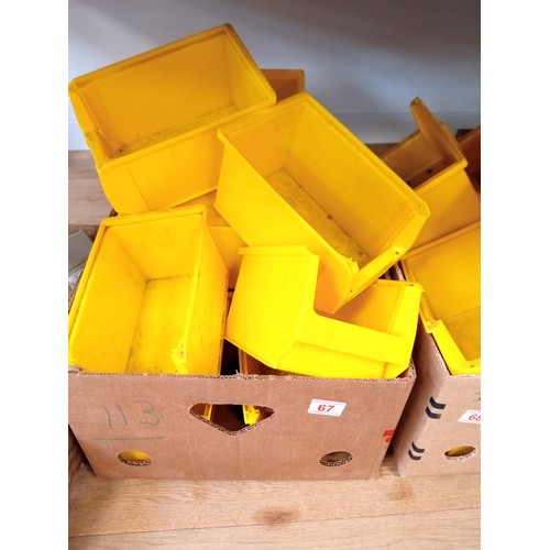 67 - A box of storage bins