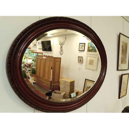 65 - Large bevelled oval mirror